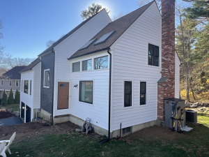 Newly installed Aspen white lapboard siding 