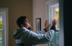 A window being installed by a NEWPRO technician