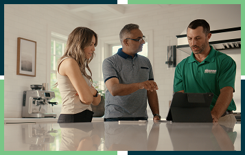 NEWPro Employees working with customers on a plan