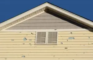 Siding that has suffered hail damage
